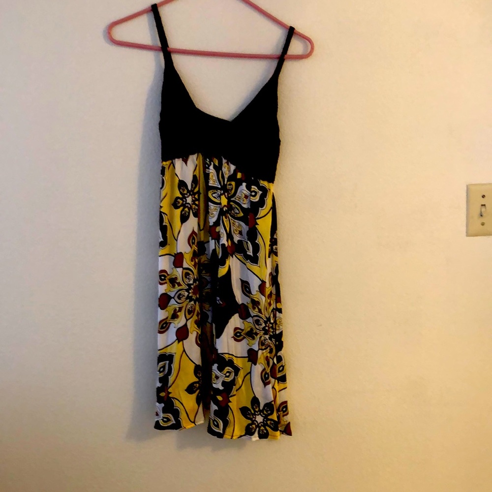 this dress has brown yellow and white colors in it and perfect for relaxing